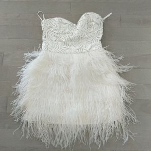 Beautiful white sequence feather dress.